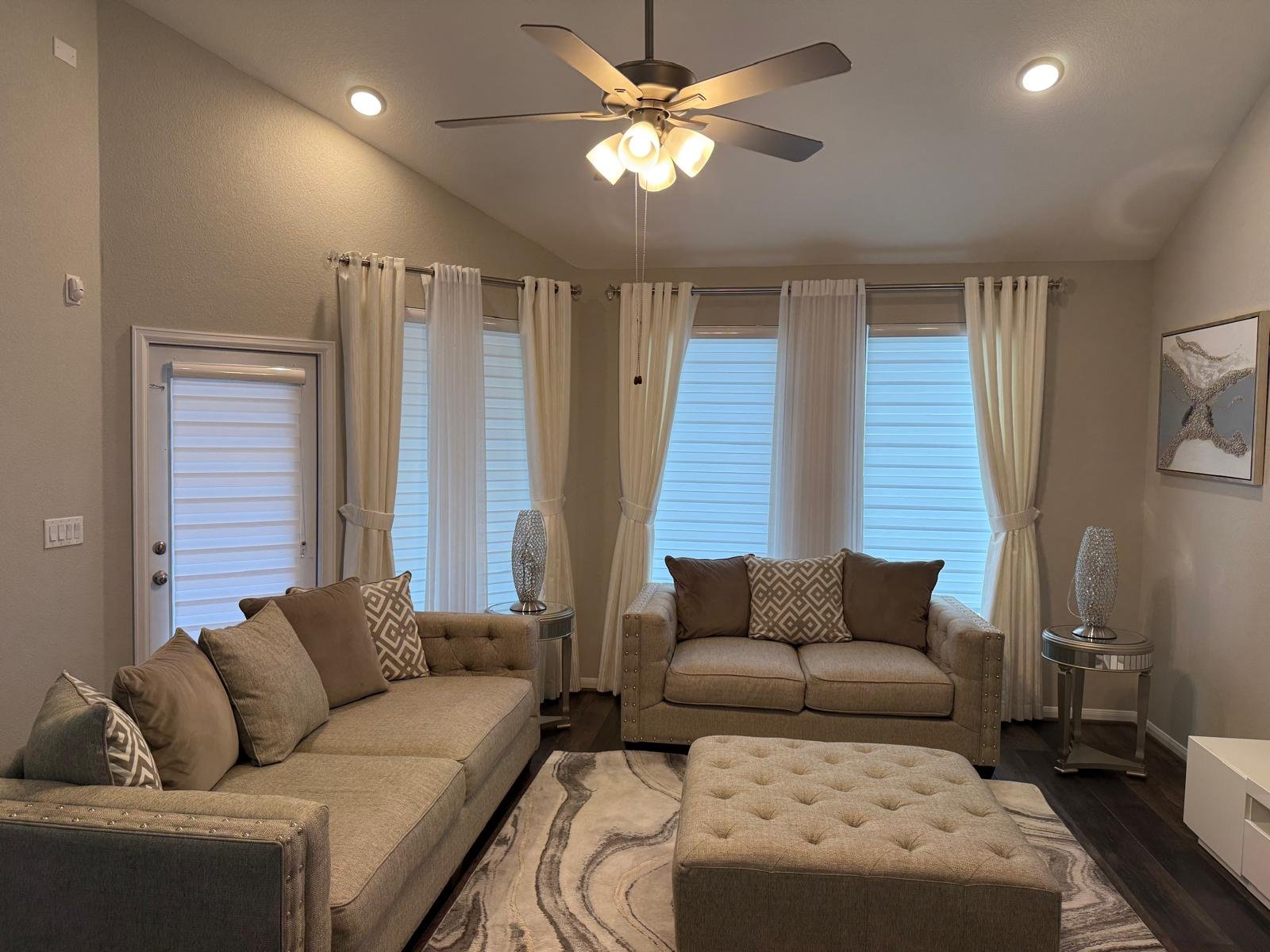 Mississauga living room layered drapery and zebra shades window covering